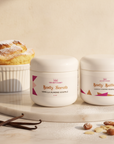 Soft Skin Set in Vanilla Almond Soufflé – Body Scrub and Body Butter beside a fresh soufflé